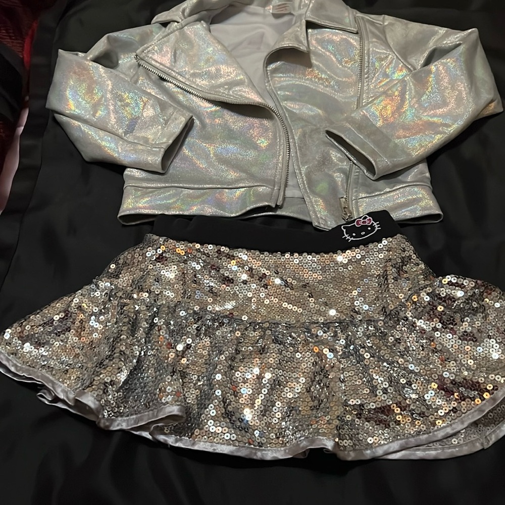 Silver sparky 4/5 skort and size 5 jacket, sparkly fun